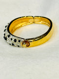 Swarovski Crystal
Gold Tone Hinged Bangle Bracelet (preowned)