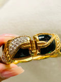 Swarovski vintage enamel, clear, crystal hinged bracelet, gold and black. (Preowned)