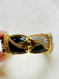 Swarovski vintage enamel, clear, crystal hinged bracelet, gold and black. (Preowned)