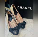 Authentic Chanel Slip on shoes in new condition no tags light pink with black. (Preowned)