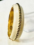 ELEGANT ST. JOHN GLOSSY CREAM ENAMEL GOLD-TONE ROPE DESIGN CUFF HINGED BRACELET (preowned)
