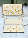 Louis Vuitton Cream and Gold Clutch with Monogram Design