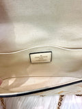 Louis Vuitton Cream and Gold Clutch with Monogram Design