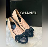 Authentic Chanel Slip on shoes in new condition no tags light pink with black. (Preowned)