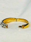 Swarovski Crystal
Gold Tone Hinged Bangle Bracelet (preowned)
