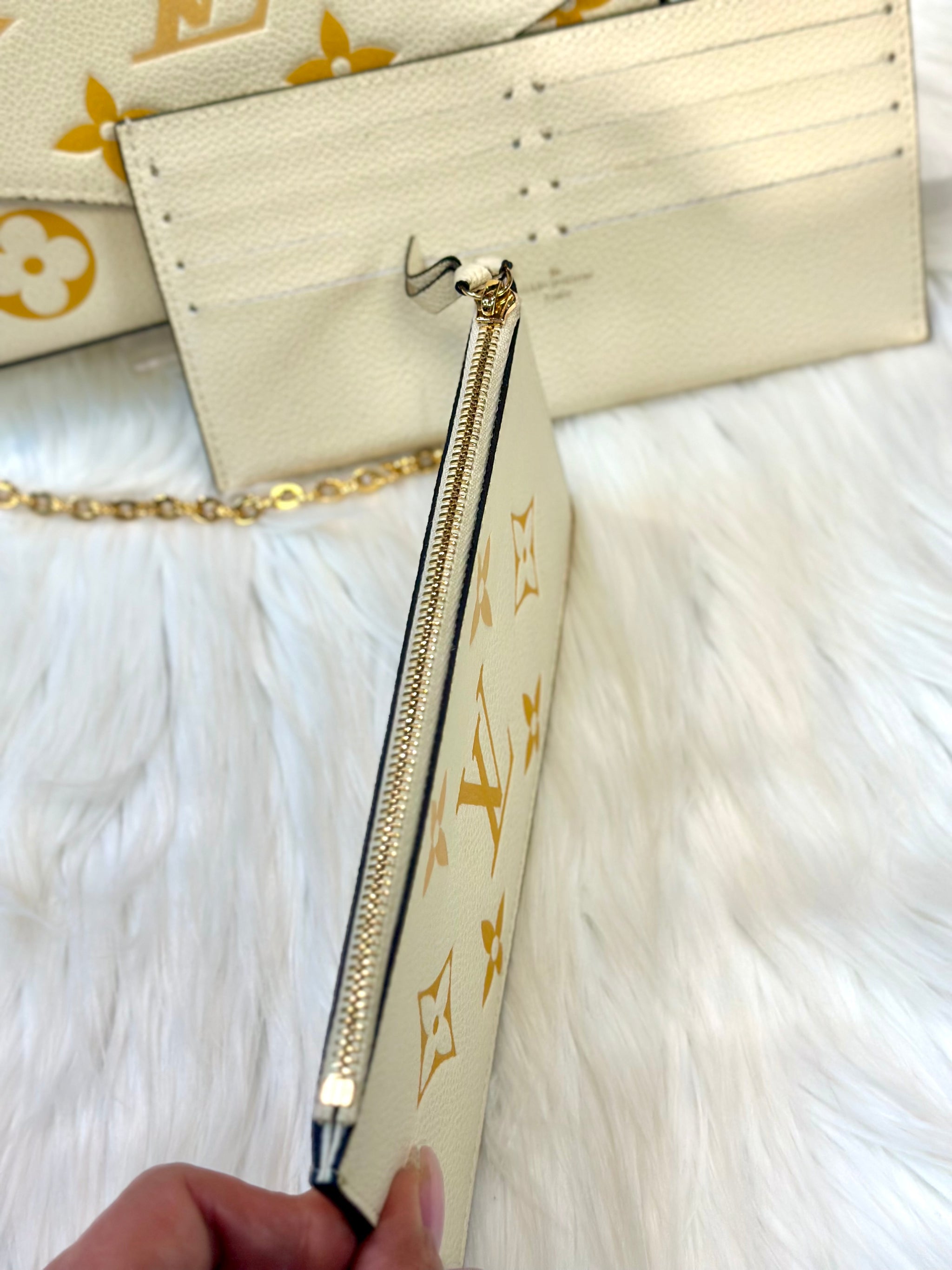 Louis Vuitton Cream and Gold Clutch with Monogram Design
