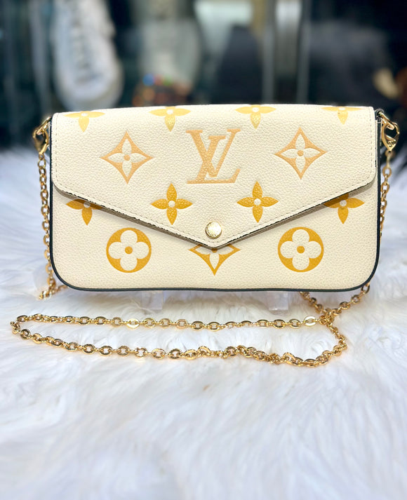 Louis Vuitton Cream and Gold Clutch with Monogram Design