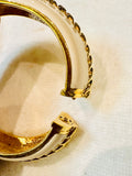 ELEGANT ST. JOHN GLOSSY CREAM ENAMEL GOLD-TONE ROPE DESIGN CUFF HINGED BRACELET (preowned)